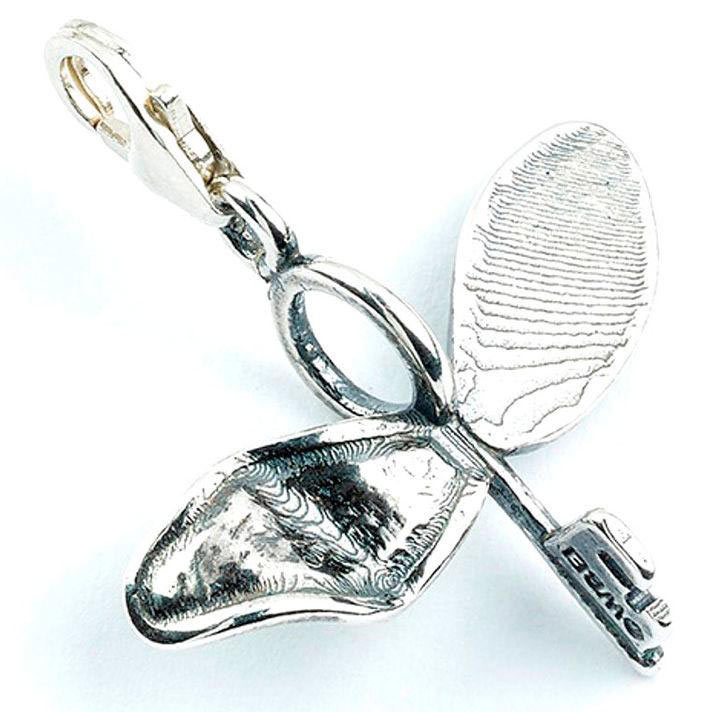 Colgante Llave Alada en plata. Harry Potter The Carat Shop