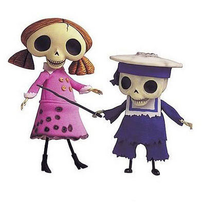 Set 2 figuras Niña y Niño esqueleto